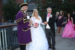 Town Crier with bride and groom