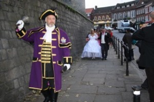Town Crier leading wedding party through Windsor